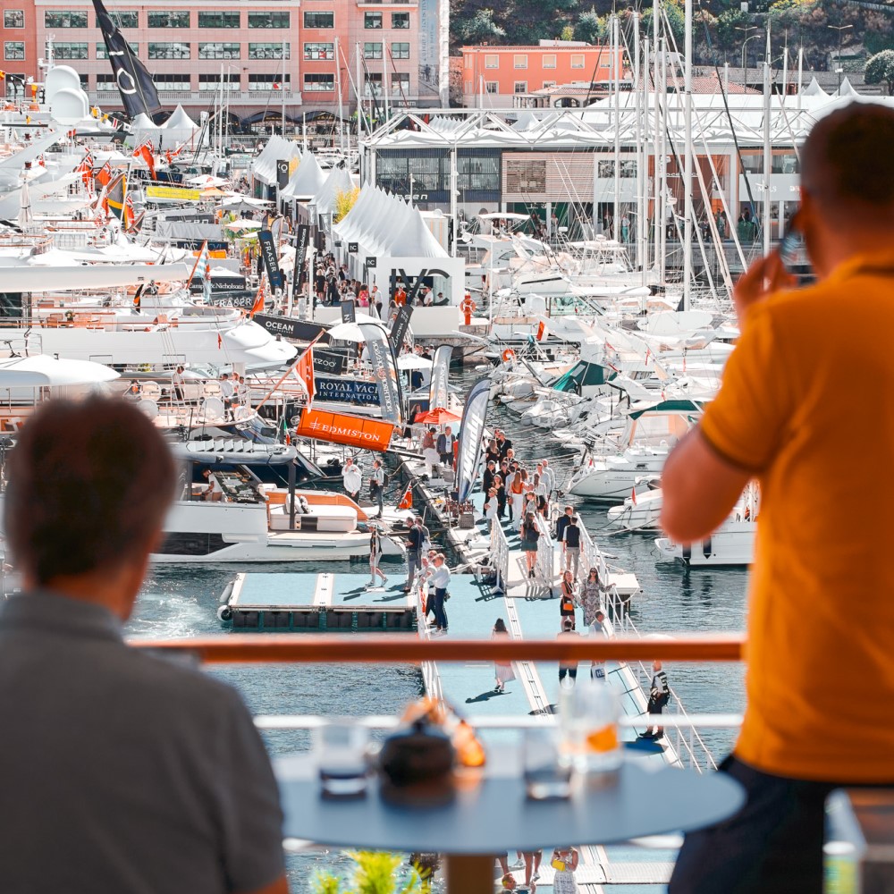 Two men overlooking Monaco harbour